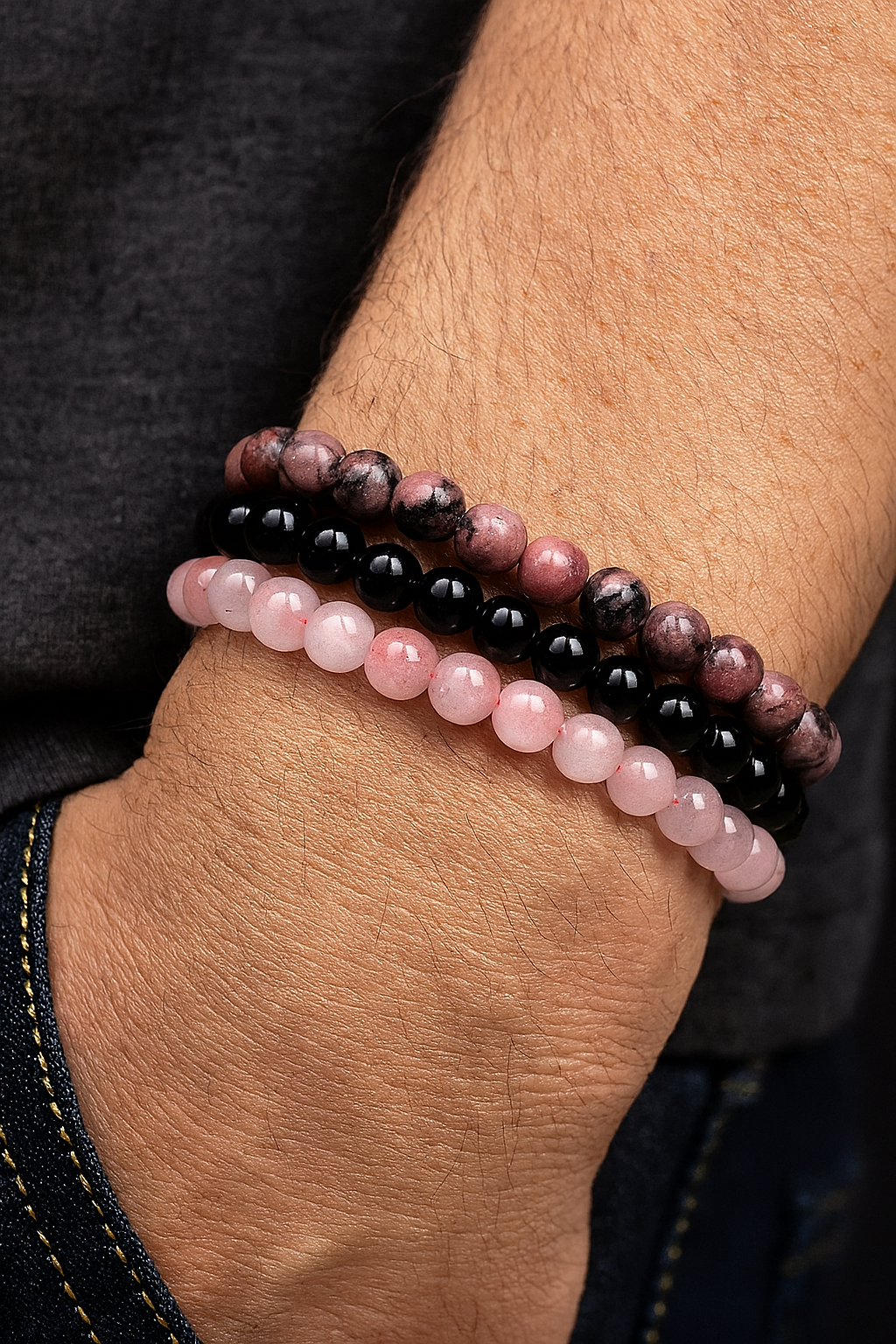 Quartz Rose, Onyx Noir et Rhodonite : trois énergies en symphonie