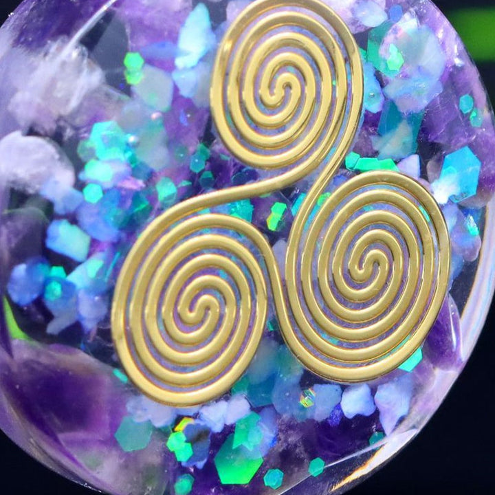 Pendentif “Triskel Celtique” en Améthyste Naturelle
