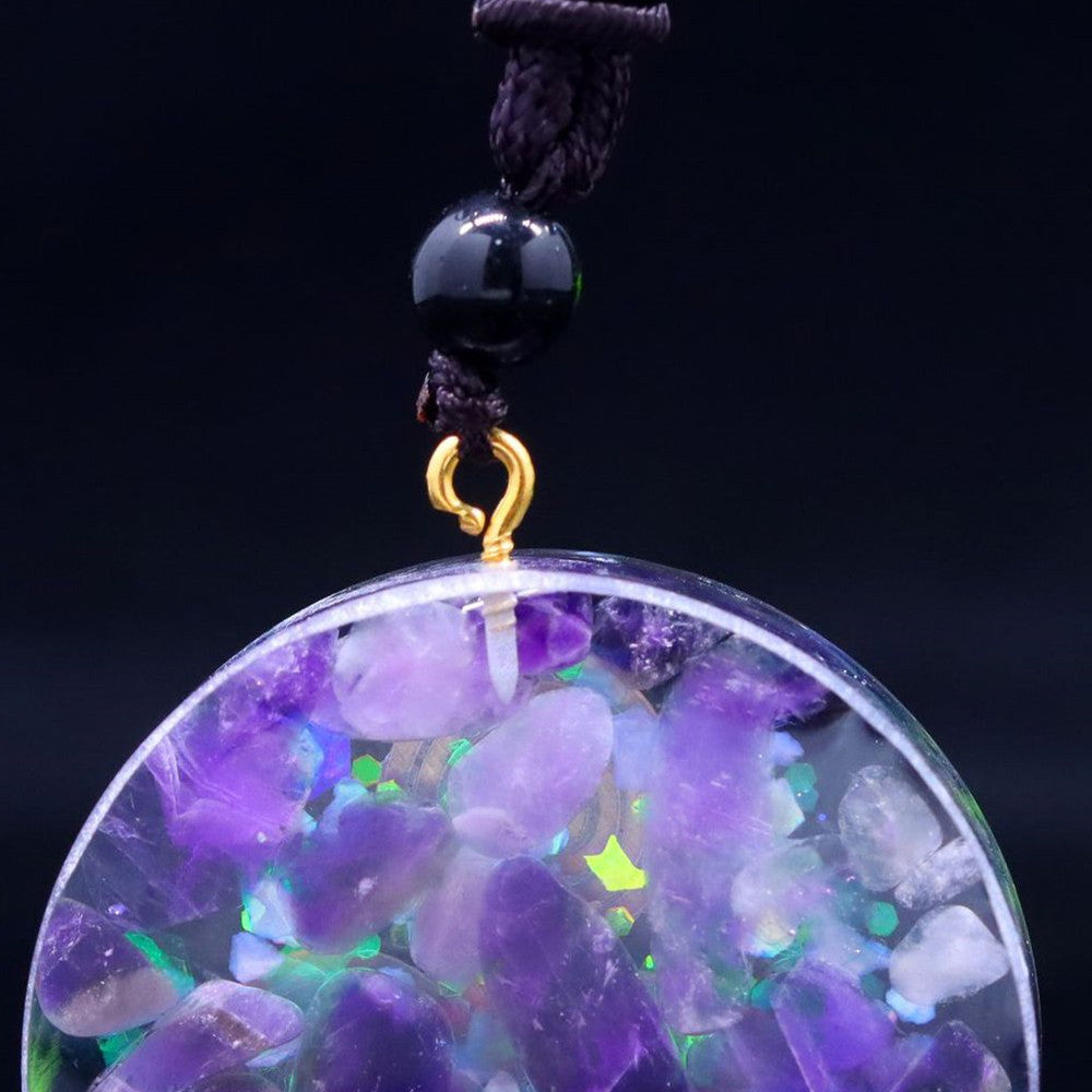 Pendentif “Triskel Celtique” en Améthyste Naturelle