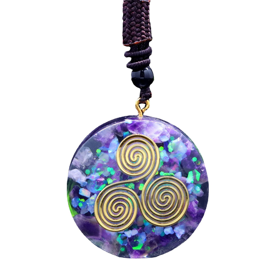 Pendentif “Triskel Celtique” en Améthyste Naturelle
